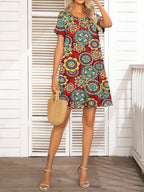 Pocketed Printed Round Neck Short Sleeve Mini Dress - All In The Bag